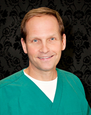 Dr-Jay-Balasz-Charlevoix-Dentist---Portrait-in-Surgical-ScrubsV2Dr-Jay-Balasz-Charlevoix-Dentist---Portrait-in-Surgical-ScrubsV2